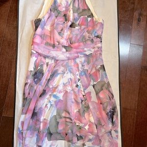 Beautiful dress from Le Chateau. Only worn once to a wedding.